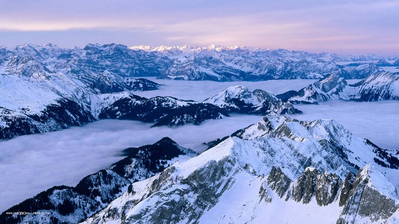 Обои горы, снег, туман, швейцария, вершины, mountains, snow, fog, switzerland, tops разрешение 1920x1080 Загрузить