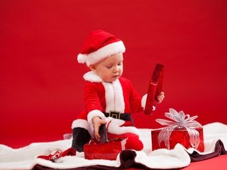 Обои бант, новый год, подарки, ребенок, мальчик, костюм, рождество, мех, санта клаус, bow, new year, gifts, child, boy, costume, christmas, fur, santa claus разрешение 2880x1920 Загрузить