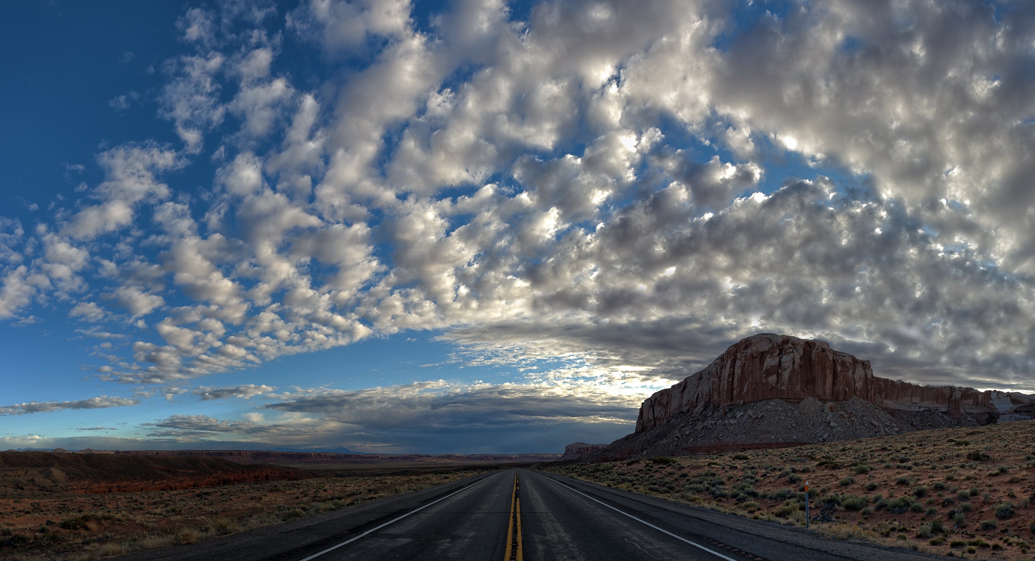 Обои небо, дорога, облака, природа, пейзаж, поле, пустыня, гора, the sky, road, clouds, nature, landscape, field, desert, mountain разрешение 2048x1110 Загрузить